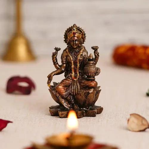 WEBELKART Premium Laxmi Ji Idol Statue for Home and Office Decor| laxmi ji murti for Home and Diwali Pooja Decorations| Diwali Puja Idols (7" Inches, ColdCast Resin)